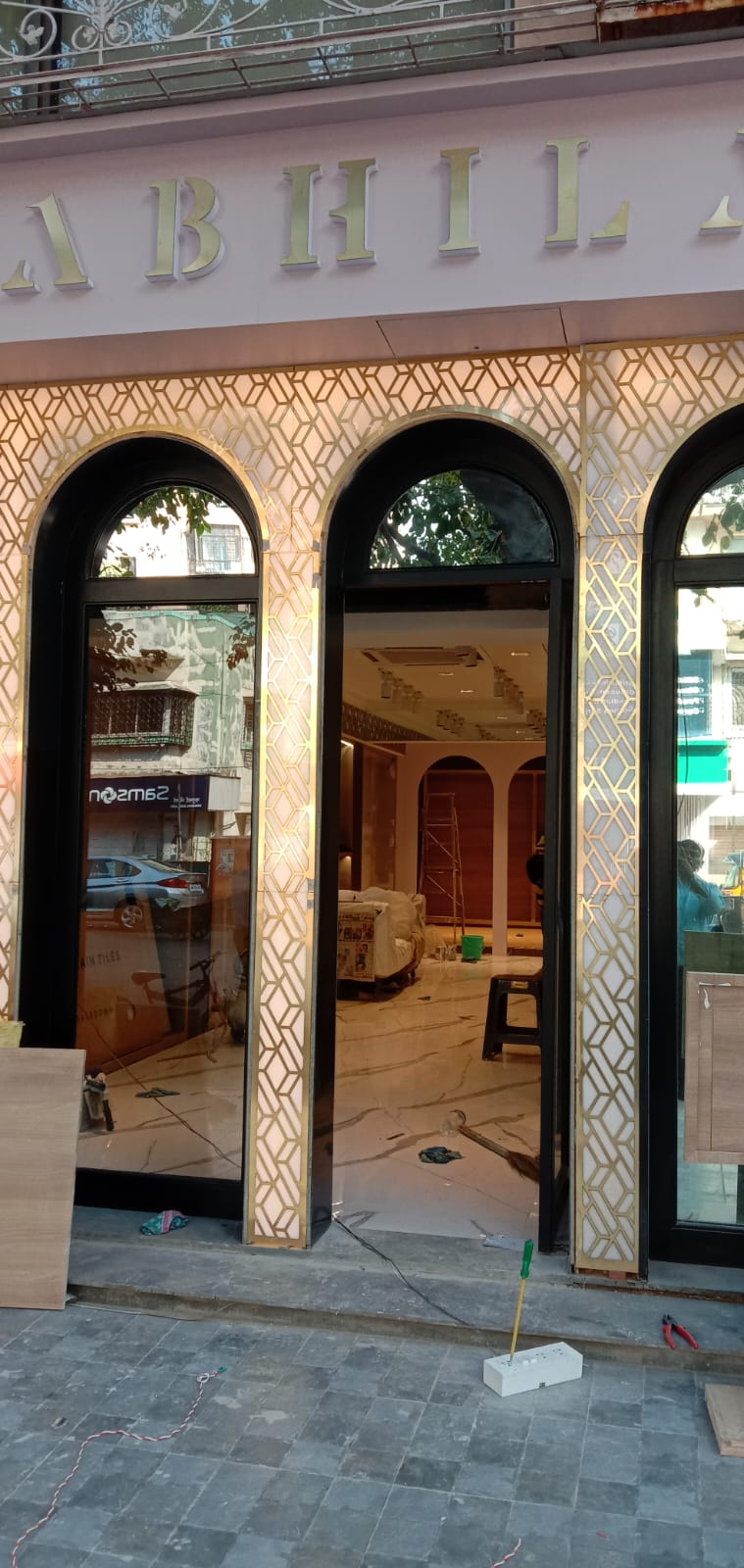 Illuminated Geometric Jaali Arch Entryway
